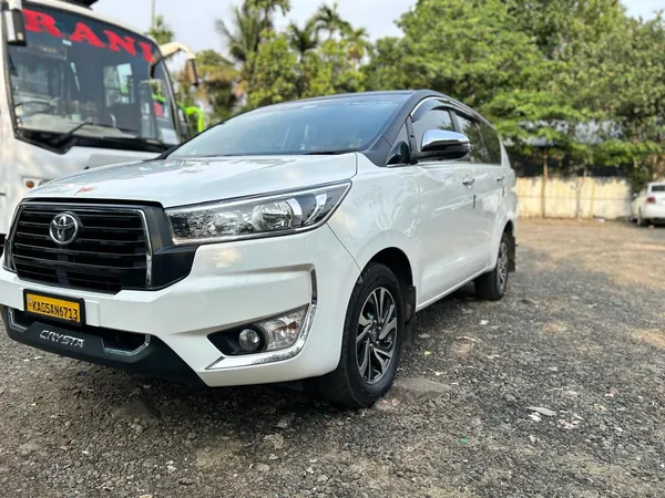 Toyota Innova Crysta outstation taxi side profile view